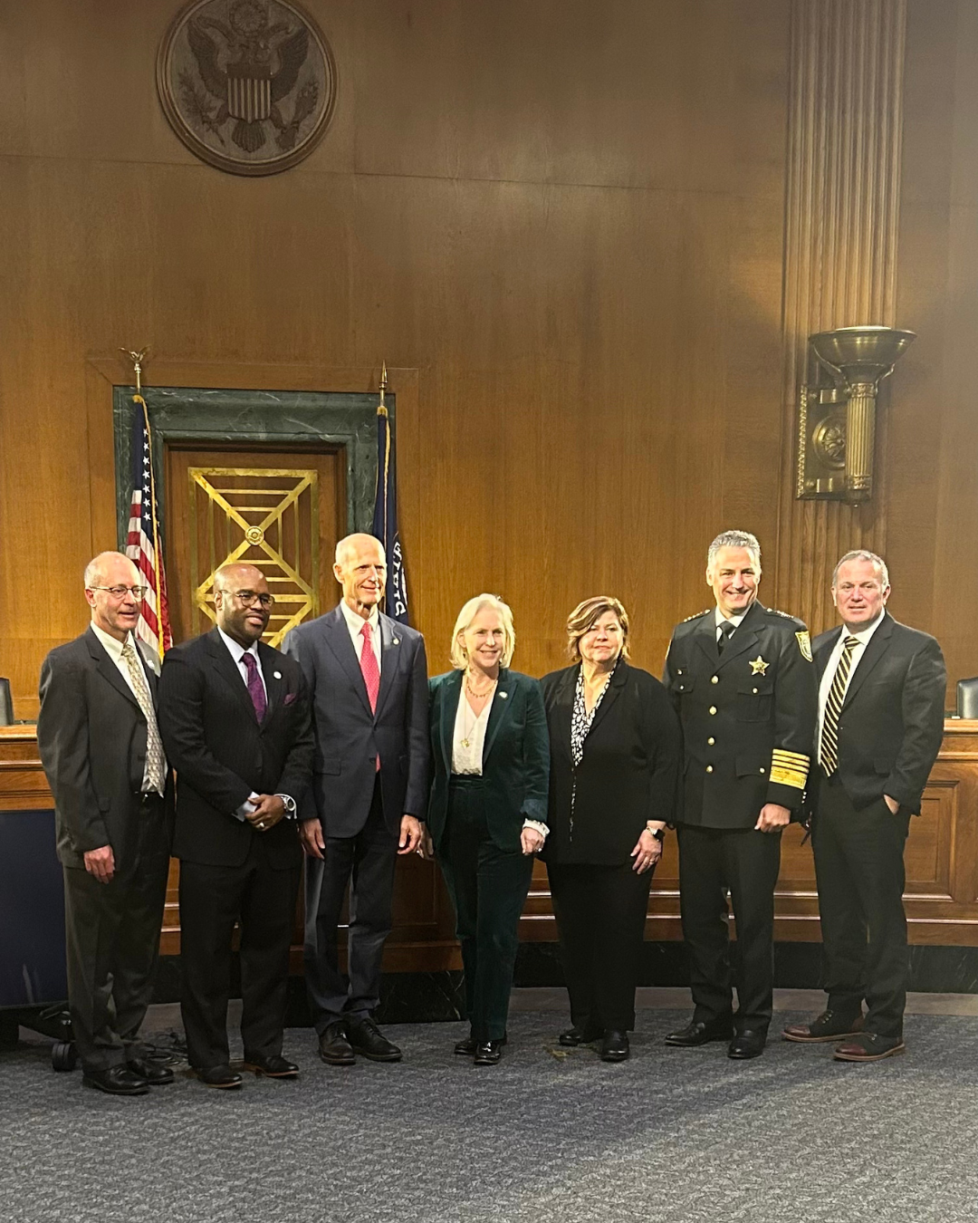Malik Burnett Senate Cmte on Aging Hearing Dr. Burnett (second from left) with Senate Aging Committee Chairman Sen. Rick Scott (third from left), Ranking Member Sen. Kirsten Gillibrand (center), and fellow witnesses.